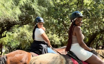 Title: Two women horse riding on a guided trail near Johannesburg, Gauteng — Uzoefu experience - Description: Two women horse riding on a guided trail near Johannesburg, Gauteng — Uzoefu experience
